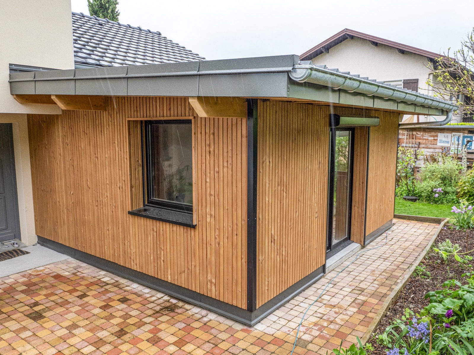 Extension ossature bois avec bardage vertical et toiture, Savoie